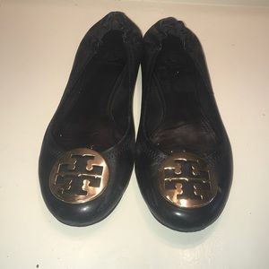 Black leather Tory Burch flats.